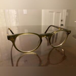 Moscot Frankie eyeglasses, olive front with tortoise temples.